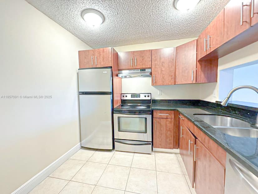 484 NW 165th St Rd # 412, Miami FL 33169